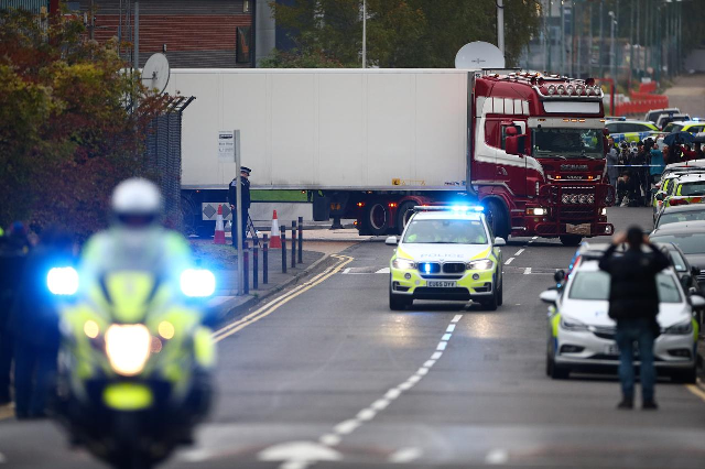 police move the lorry container where bodies were discovered in grays essex photo reuters