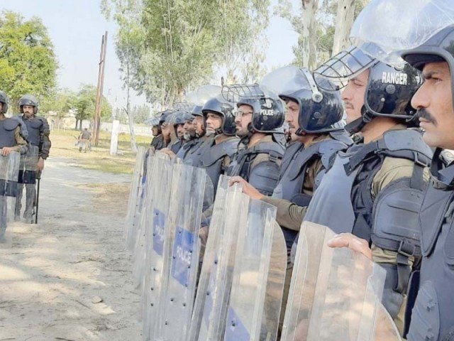 rawalpindi police take part in an anti riot drill as part of preparation for the jui f azadi march photo express