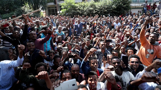 oromo youth shout slogans outside jawar mohammed 039 s house an oromo activist and leader of the oromo protest in addis ababa ethiopia on october 23 2019 photo reuters