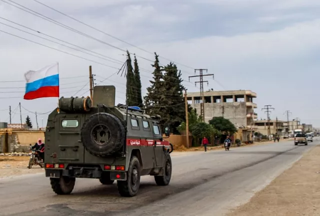 russian military police vehicles drive in a joint patrol with the syrian kurdish asayish internal security forces in the town of kobane also known as ain al arab in the north of syria 039 s aleppo province on october 25 2019 photo afp russian military police vehicles drive in a joint patrol with the syrian kurdish asayish internal security forces in the town of kobane also known as ain al arab in the north of syria 039 s aleppo province on october 25 2019 photo afp
