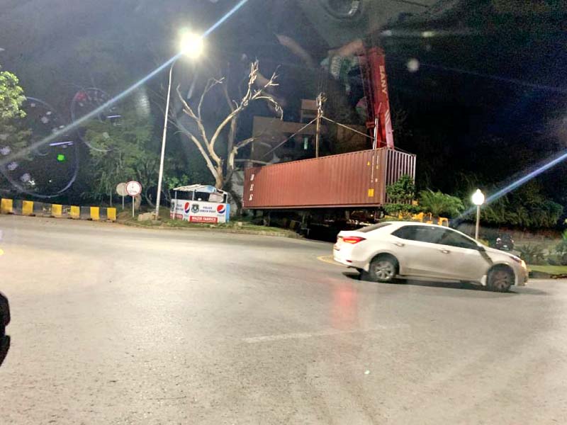 police have placed containers to block roads leading to the red zone photo express