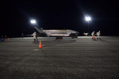 secretive military spaceplane lands in florida after record long orbital flight