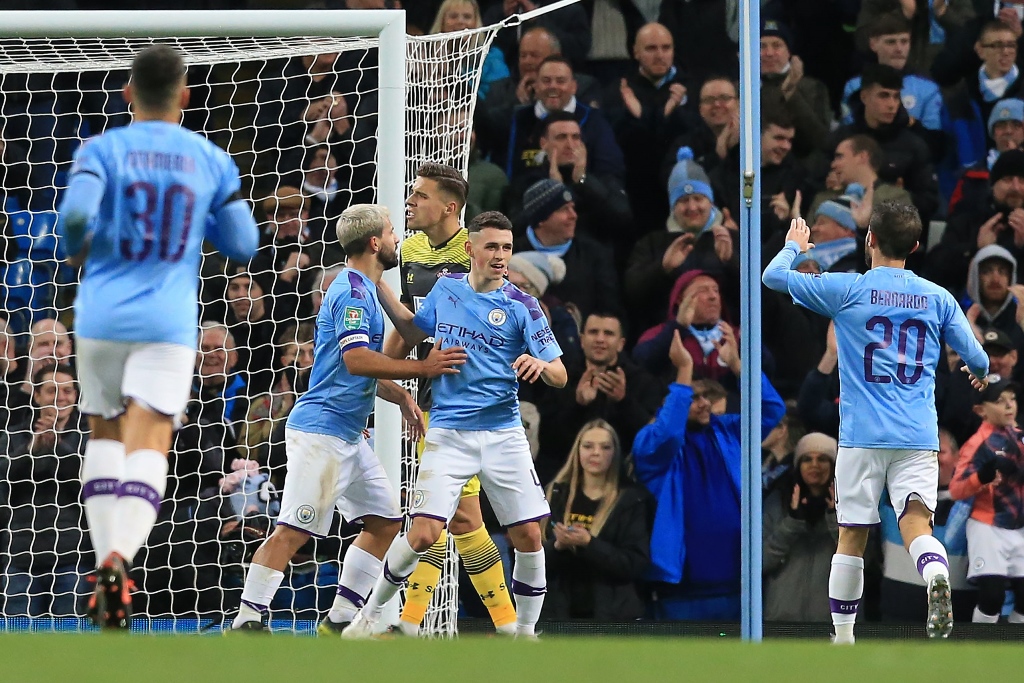 second string side guardiola had made nine changes to the team that beat aston villa in the premier league on saturday giving a debut to 18 year old midfielder tommy doyle photo afp