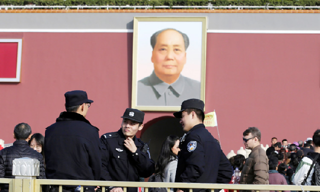 policemen are seen in front of tiananmen gate in beijing china photo reuters