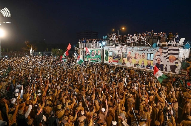 supporters of jamiat ulema e islam jui f gather beside a stage during an anti government quot azadi march 039 photo afp