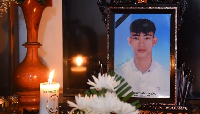 a portrait of 20 year old nguyen dinh luong who is feared to be among the 39 people found dead in a truck in britain photo afp