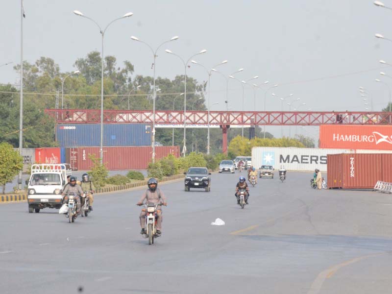 a view of containers still lying on roads in islamabad photo inp