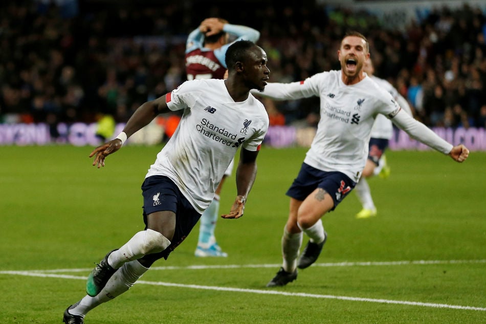 the reds chasing their first english title since 1990 are six points ahead of second placed citizens photo afp