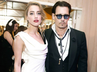 johnny depp s ex wife says he bribed witnesses to maintain silence on abuse