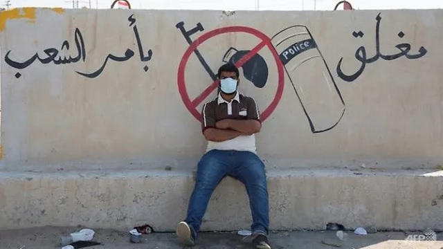 quot closed by order of the people quot iraqi protesters have blocked the highway leading to a key port near basra photo afp