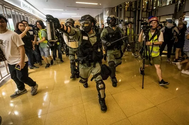 beijing warned after a four day meeting of communist party leaders that it would not tolerate any challenges to its authority over hong kong photo afp beijing warned after a four day meeting of communist party leaders that it would not tolerate any challenges to its authority over hong kong photo afp
