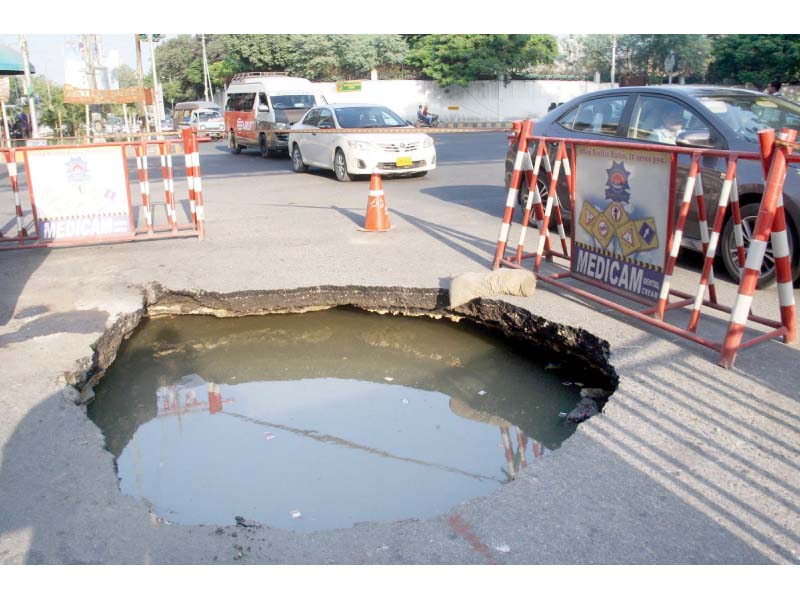 a portion of the club road near hotel metropole caved in on monday morning due to the collapse of a 54 inch sewerage line photo online