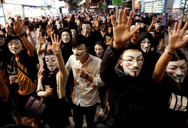 masked protesters photo reuters masked protesters photo reuters