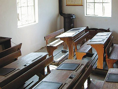 teacher booked for beating student