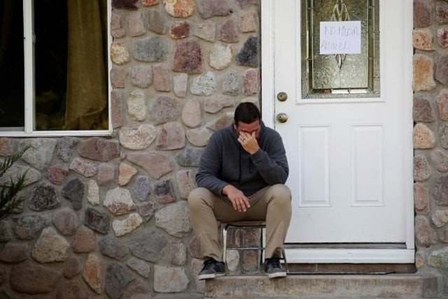 a relative of rhonita maria miller who was killed along with her children and other members of the mexican american mormon community by unknown assailants reacts outside her house in la mora photo reuters a relative of rhonita maria miller who was killed along with her children and other members of the mexican american mormon community by unknown assailants reacts outside her house in la mora photo reuters