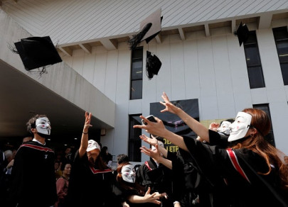 masked university students rally at graduation ceremony in hong kong masked university students rally at graduation ceremony in hong kong