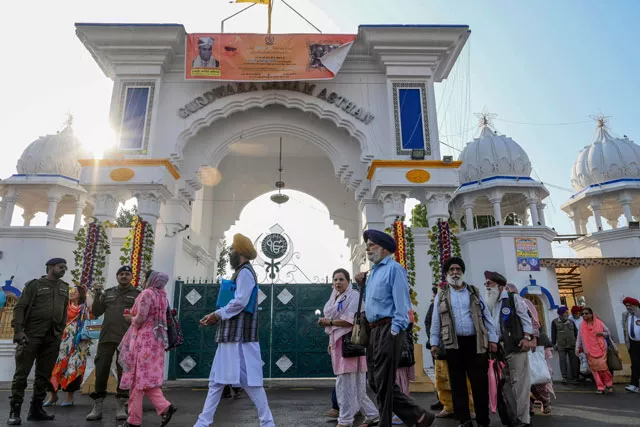 sikh pilgrims visit the shrine in nankana sahib on the occasion of the 550th birth anniversary of guru nanak dev photo afp sikh pilgrims visit the shrine in nankana sahib on the occasion of the 550th birth anniversary of guru nanak dev photo afp