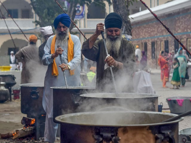 in this picture taken on november 6 2019 sikh pilgrims walk in front of the shrine of baba guru nanak dev at the gurdwara darbar sahib ahead of its opening in the pakistani town of kartarpur near the indian border thousands of sikh pilgrims are expected around the world to visit to pakistan to celebrate the 550th birth anniversary of sri guru nanak dev which falls on november 12 photo afp in this picture taken on november 6 2019 sikh pilgrims walk in front of the shrine of baba guru nanak dev at the gurdwara darbar sahib ahead of its opening in the pakistani town of kartarpur near the indian border thousands of sikh pilgrims are expected around the world to visit to pakistan to celebrate the 550th birth anniversary of sri guru nanak dev which falls on november 12 photo afp