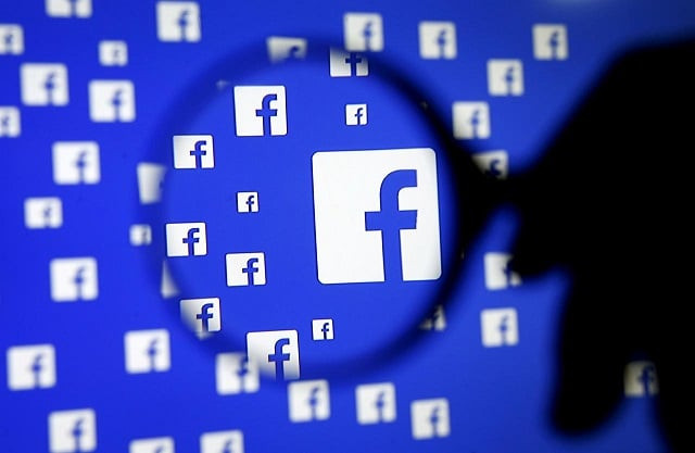 a man poses with a magnifier in front of a facebook logo on display in this illustration taken in sarajevo bosnia and herzegovina december 16 2015 photo reuters a man poses with a magnifier in front of a facebook logo on display in this illustration taken in sarajevo bosnia and herzegovina december 16 2015 photo reuters