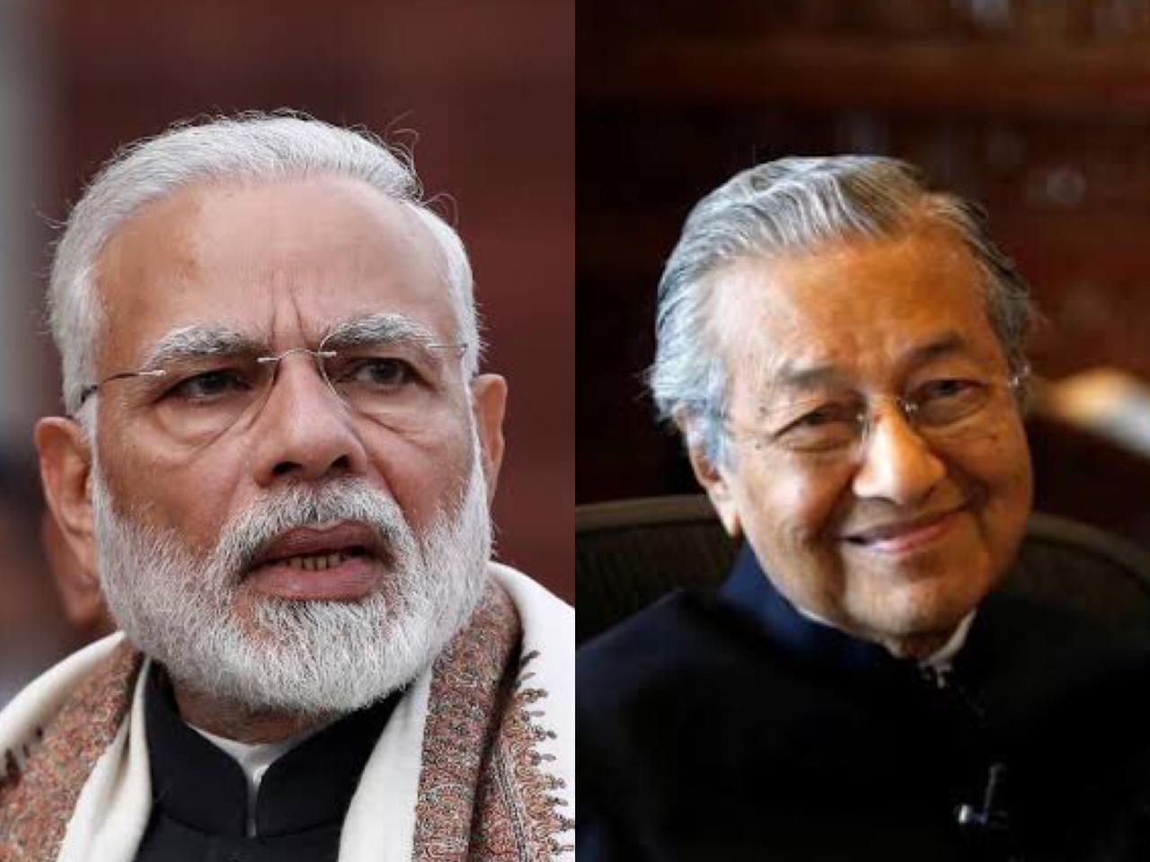 reuters file photos of indian premier narendra modi l and malaysian prime minister mahathir mohmad