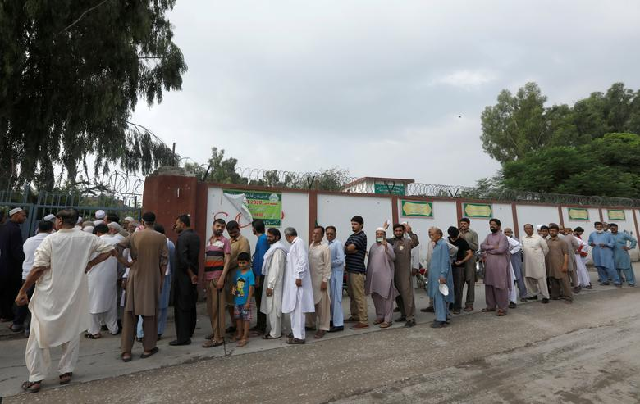 people standing in line ready to vote photo reuters