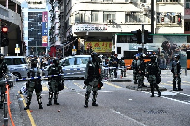 hong kong police shot a protester on monday in the latest escalation in the city 039 s political crisis photo afp