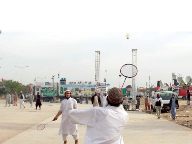 azadi march participants play badminton to stay active photo online azadi march participants play badminton to stay active photo online
