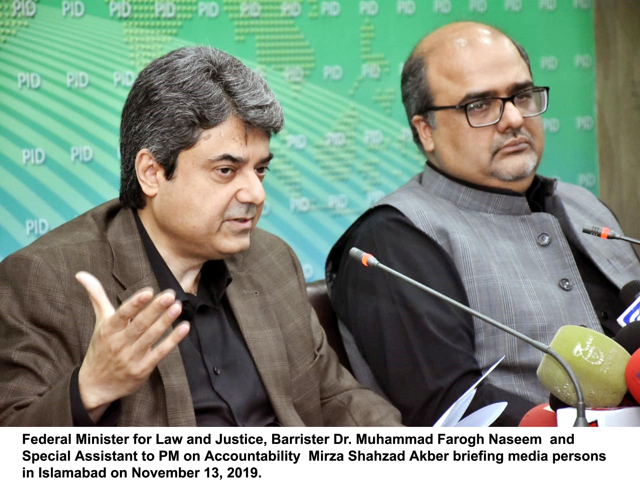 law minister farogh naseem and special assistant to pm on accountability mirza shahzad akbar briefs media persons in islamabad on wednesday photo pid