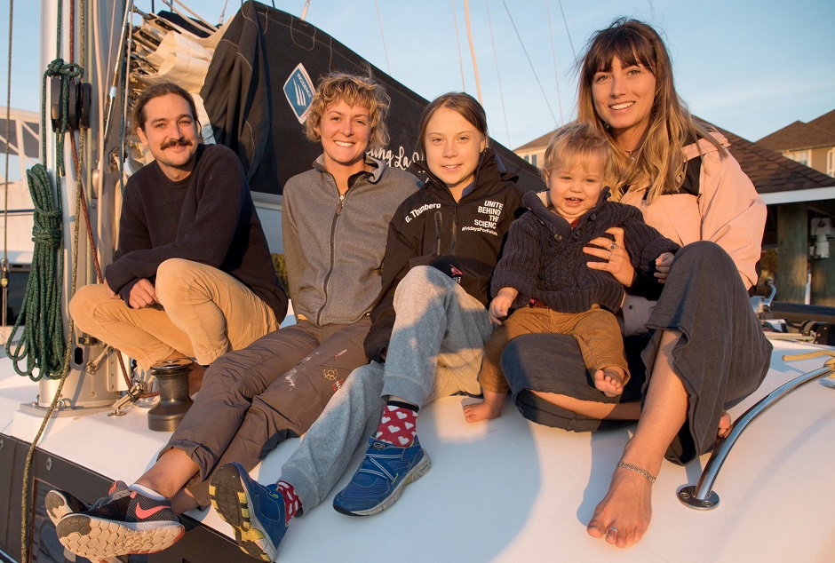 swedish teen environmental activist greta thunberg 3rd from left poses on the la vagabonde a 48 foot catamaran with those offering her a ride across the atlantic ocean in virginia us november 12 2019 photo reuters