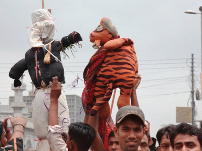 tiggers and tyres burnt effigies and trucks set on fire as ethnic lines drawn