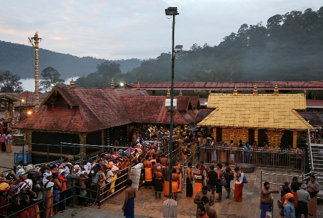 hindu devotees wait in queues inside the premises of the sabarimala temple in pathanamthitta district in the southern state of kerala india photo reuters