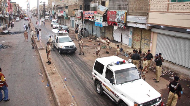 two mqm workers gunned down in shah faisal town