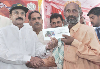 watan cards launched to compensate flood survivors