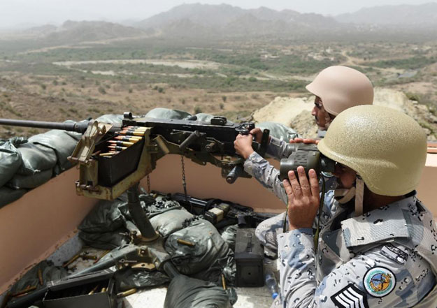 members of the saudi border guard are stationed at a look out point on the saudi yemeni border in southwestern saudi arabia photo afp