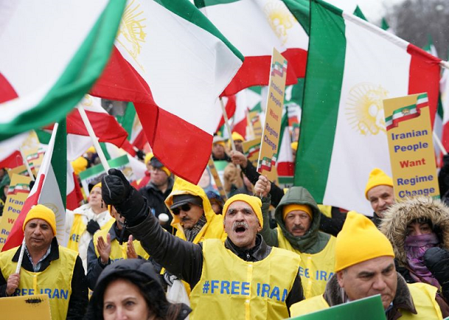 protesters in washington waved iranian flags as they chanted for quot regime change now quot photo afp