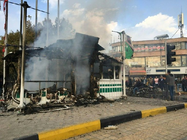 iranian security force targets have come under attack by protesters in several cities like this police station in the central city of isfahan photo afp