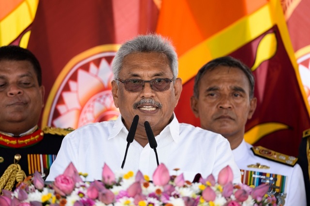 sri lanka 039 s new president gotabaya rajapaksa centre speaks after taking oath of office during his swearing in ceremony at the ruwanwelisaya temple in anuradhapura photo afp