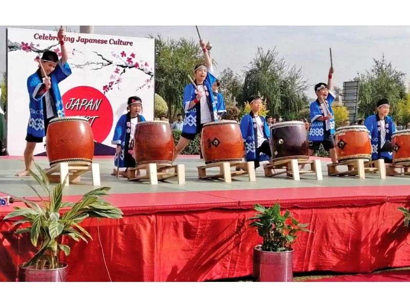 artistes playing traditional japanese drums and demonstrating a ninja performance at the japanese festival at numl photo express