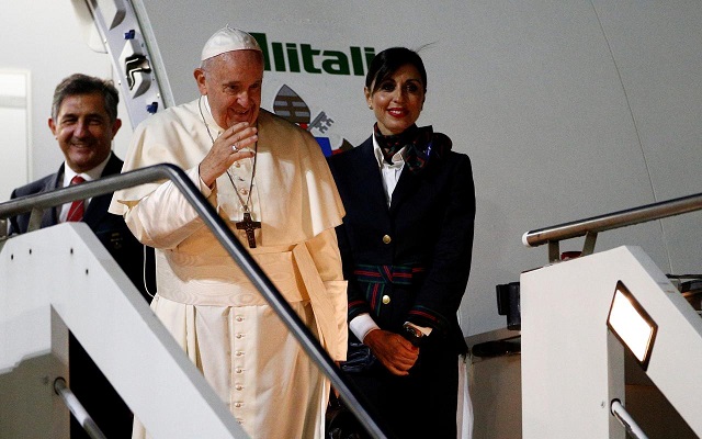 pope francis waves as he boards the airplane to depart fiumicino airport to begin his apostolic visit to thailand and japan in rome italy november 19 2019 photo reuters