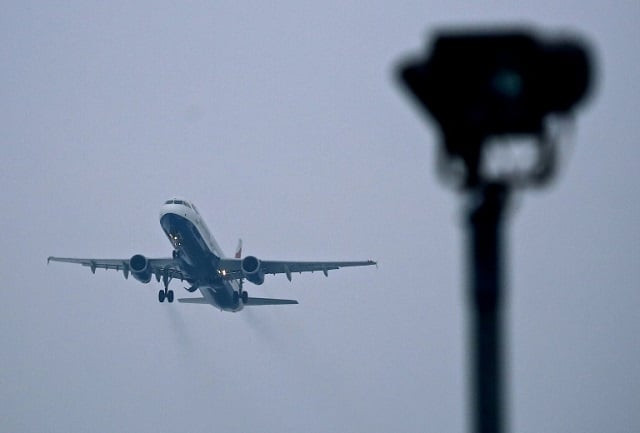 the airline industry estimates it accounts for 2 3 percent of global co2 emissions photo afp the airline industry estimates it accounts for 2 3 percent of global co2 emissions photo afp