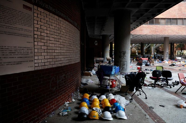 helmets of protesters are left behind in hong kong polytechnic university polyu in hong kong photo reuters