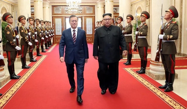 south korean president moon jae in is greeted by north korean leader kim jong un as he arrives at the headquarters of the central committee of the workers 039 party of korea for their meeting in pyongyang north korea september 18 2018 photo reuters