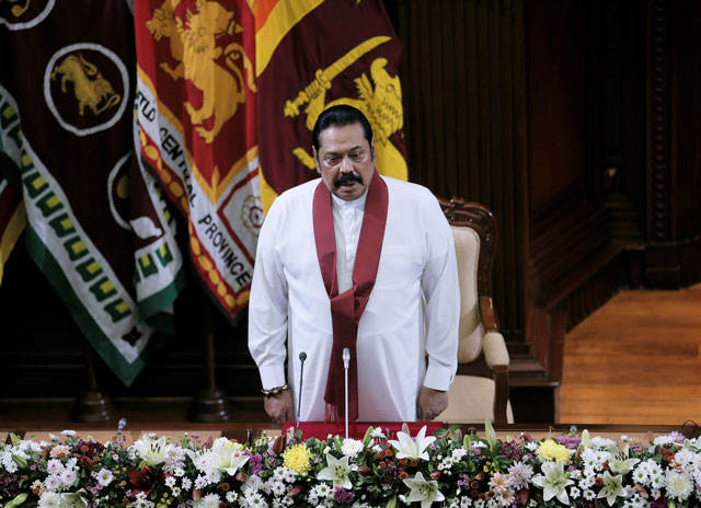 sri lanka 039 s former leader mahinda rajapaksa who was appointed as the new prime minister looks on during the swearing in ceremony in colombo sri lanka novermber 21 2019 photo reuters