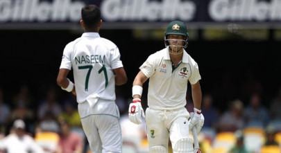 warner hits century as australia take control of brisbane test warner hits century as australia take control of brisbane test