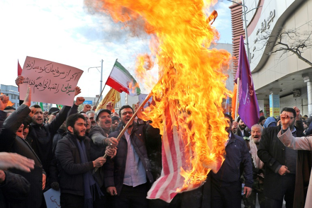 iranian men burn a us flag during a protest in support of the islamic republic 039 s government and supreme leader ayatollah ali khamenei photo afp