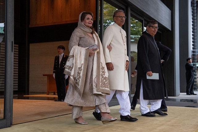 president arif alvi and his wife samina alvi leave after attending the enthronement ceremony of emperor naruhito of japan photo reuters