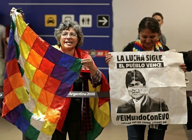 bolivian citizens living in argentina wait at the buenos aires airport for the arrival of former bolivian president evo morales 039 s children evaliz and alvaro they were granted political asylum in argentina photo afp bolivian citizens living in argentina wait at the buenos aires airport for the arrival of former bolivian president evo morales 039 s children evaliz and alvaro they were granted political asylum in argentina photo afp