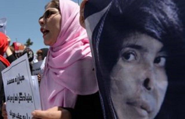 afghan university students and independent civil society activists take part in a demonstration in support of passing the elimination of violence against women law in front of parliament in kabul photo afp file