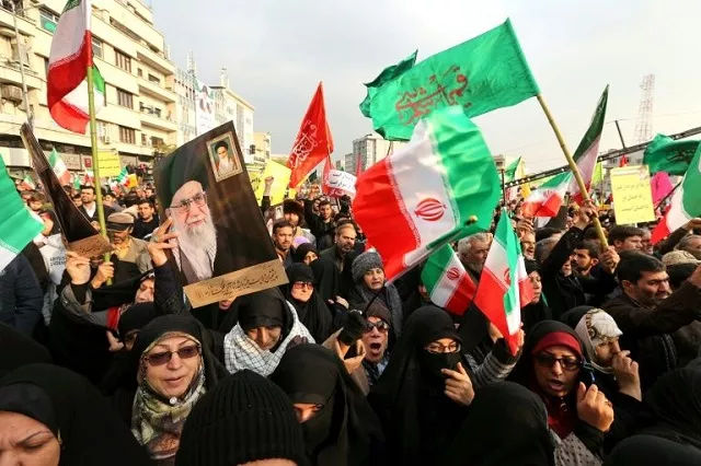 iranian pro government demonstrators raise national flags and pictures of the islamic republic 039 s supreme leader ayatollah ali khamenei as they gather in the capital tehran 039 s central enghelab square photo afp iranian pro government demonstrators raise national flags and pictures of the islamic republic 039 s supreme leader ayatollah ali khamenei as they gather in the capital tehran 039 s central enghelab square photo afp