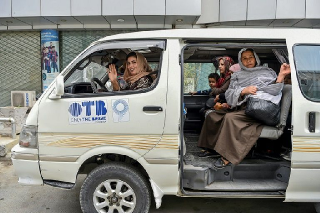 pink shuttle buses help afghan women navigate conservative society